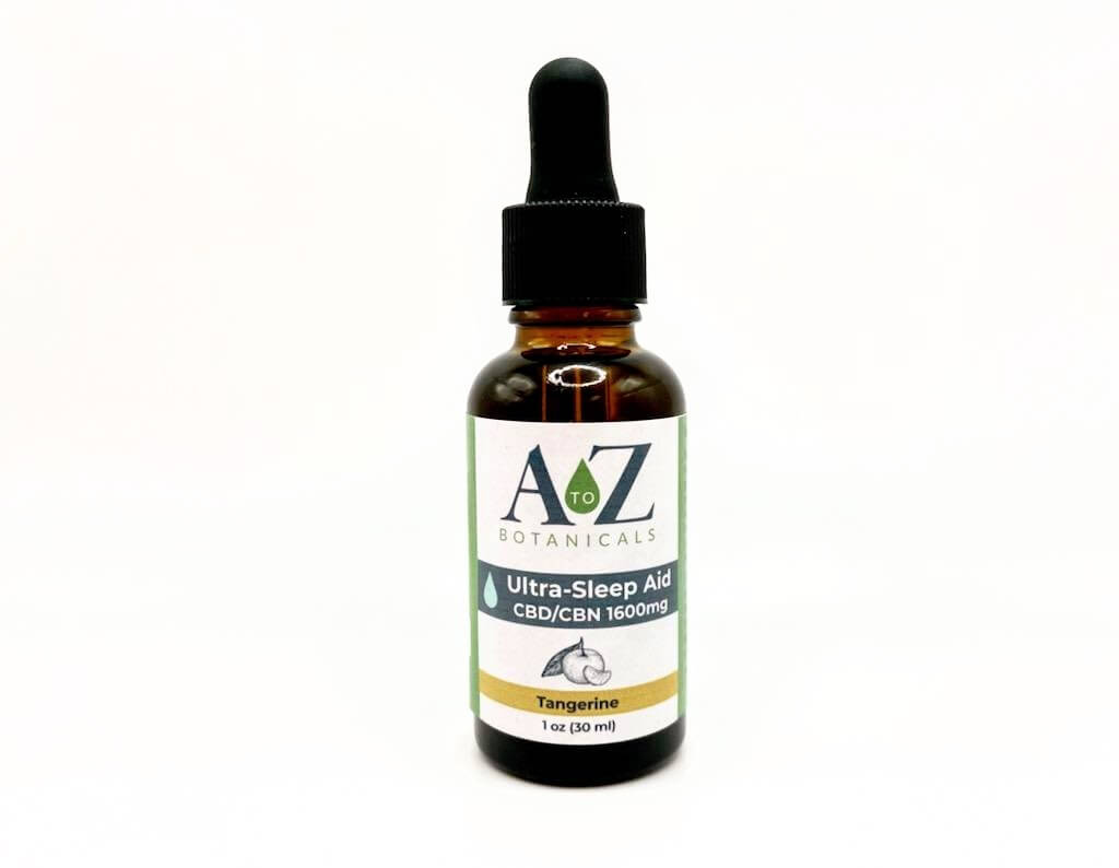 A to Z Botanicals Ultra-Sleep Aid CBD/CBN 1200mg Tincture in Tangerine flavor, isolated on a white background.